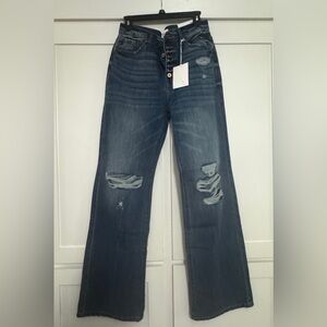 Women's Distressed Blue Jeans